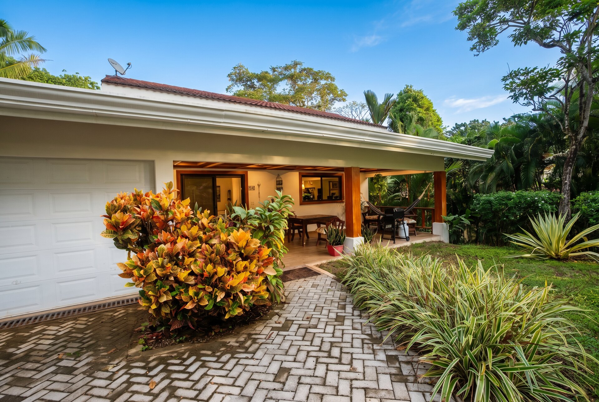Entrance with tropical plantings